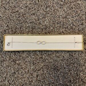 Radiant Gold Charm Bracelet with Intricate Detailing